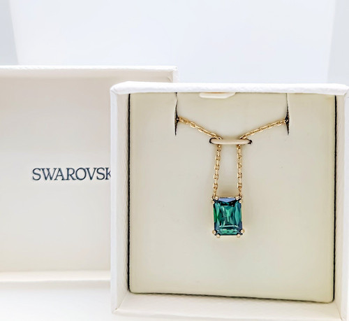 New authentic swarovski - new, gold